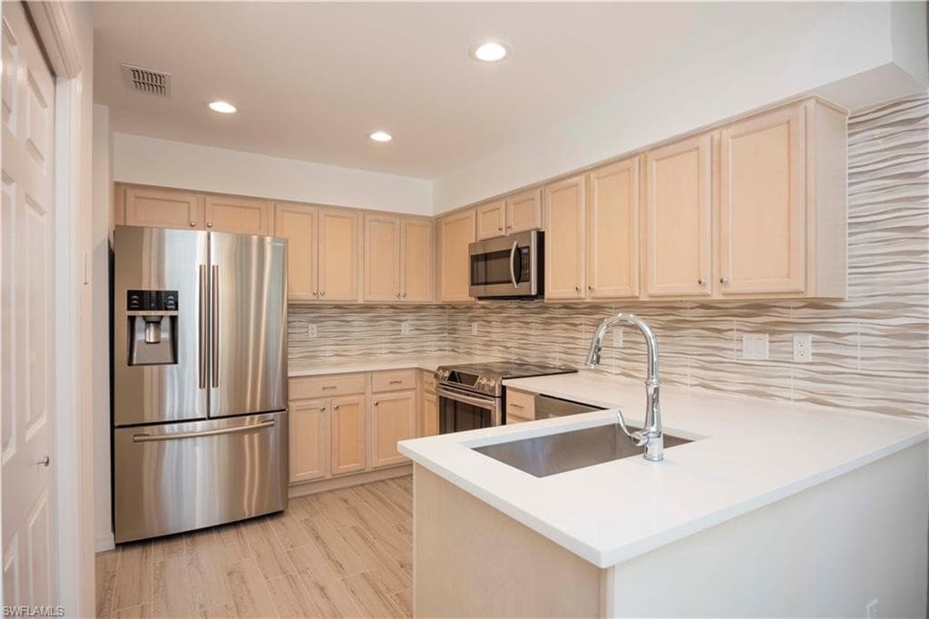 mosaic tile, upgraded LED lighting, generous pantry