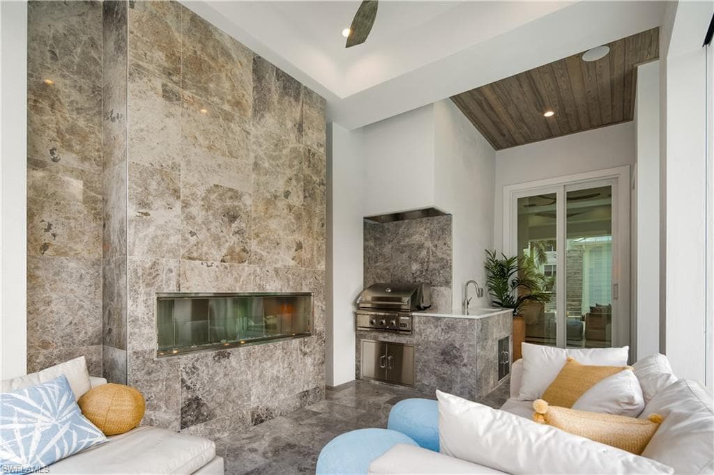outdoor fireplace and kitchen