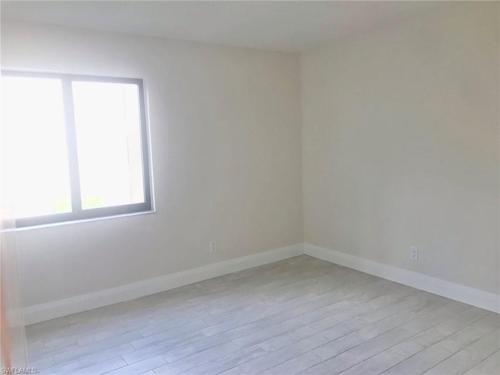Guest bedroom with impact window