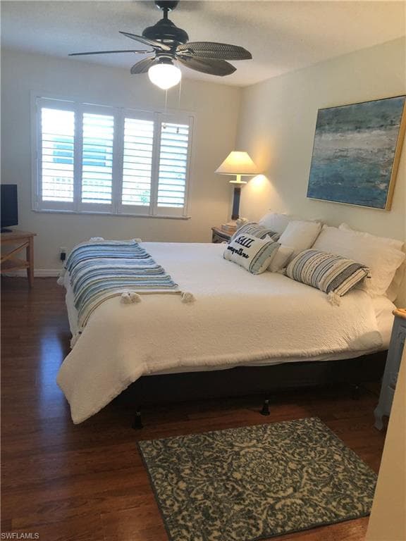 laminated floor as well as three fans in living spaces