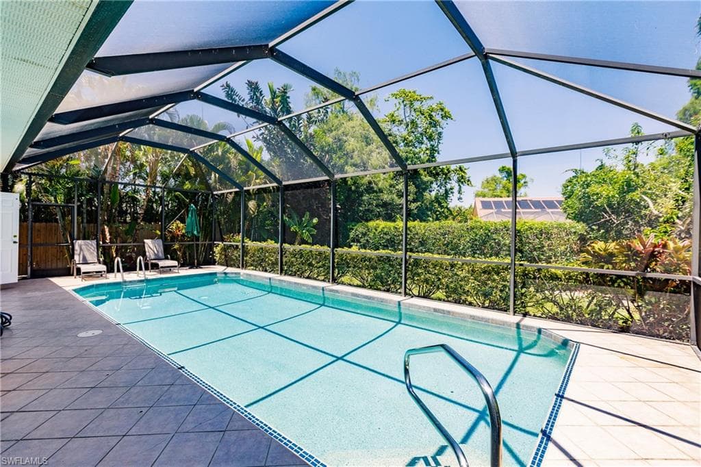 SCREENED 14FT X 30FT HEATED POOL