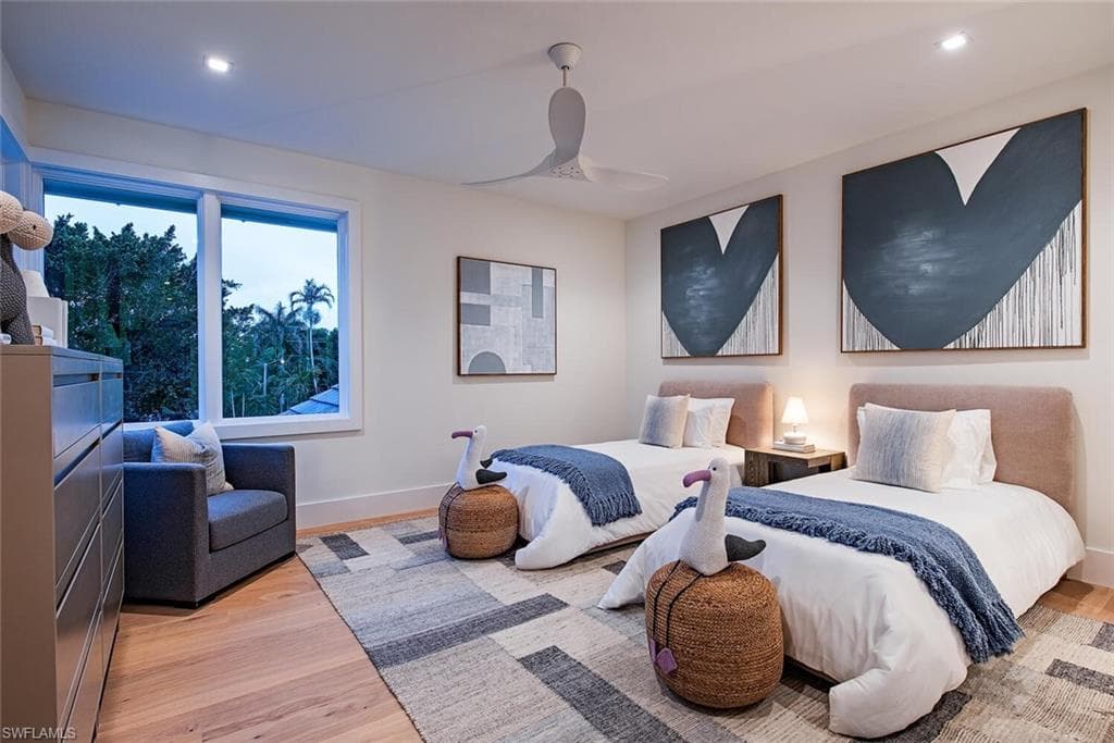 Bedroom with baseboards, a ceiling fan, wood finished floors, and recessed lighting
