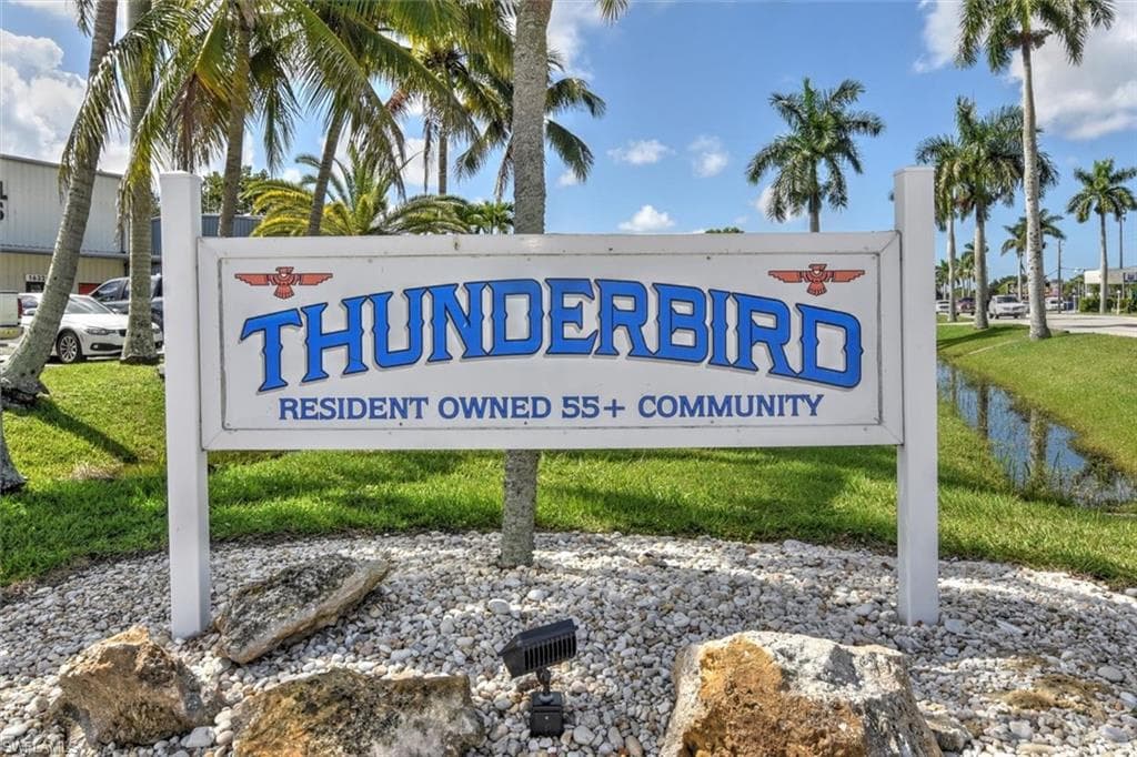 Community sign with a lawn