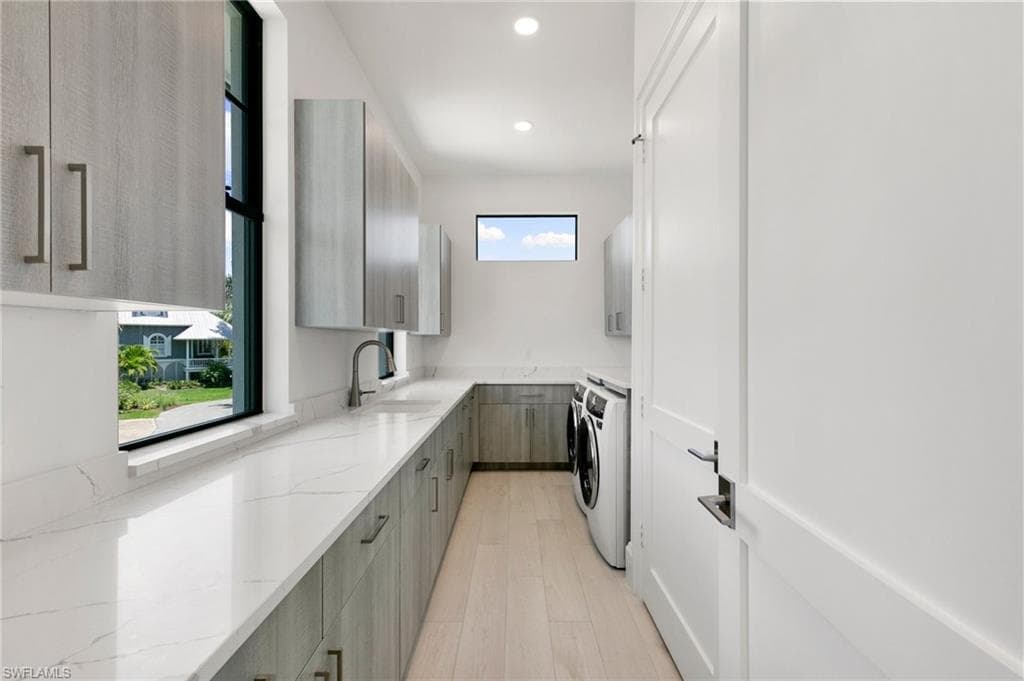 Spacious Laundry with storage & Natural Light