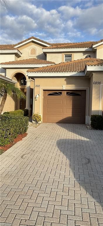 Unit 202 Garage and Driveway