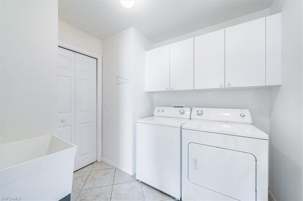 Laundry room with a wash tub and extra storage
