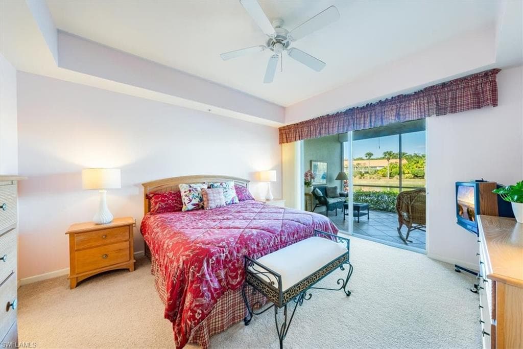 Bright & sunny primary room with lake views