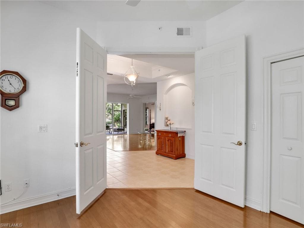 Hall featuring hardwood / wood-style floors