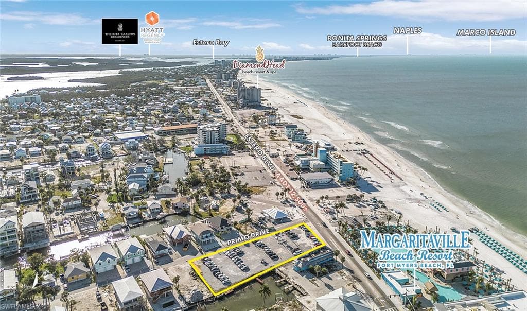 Bird's eye view featuring a view of the beach and a water view