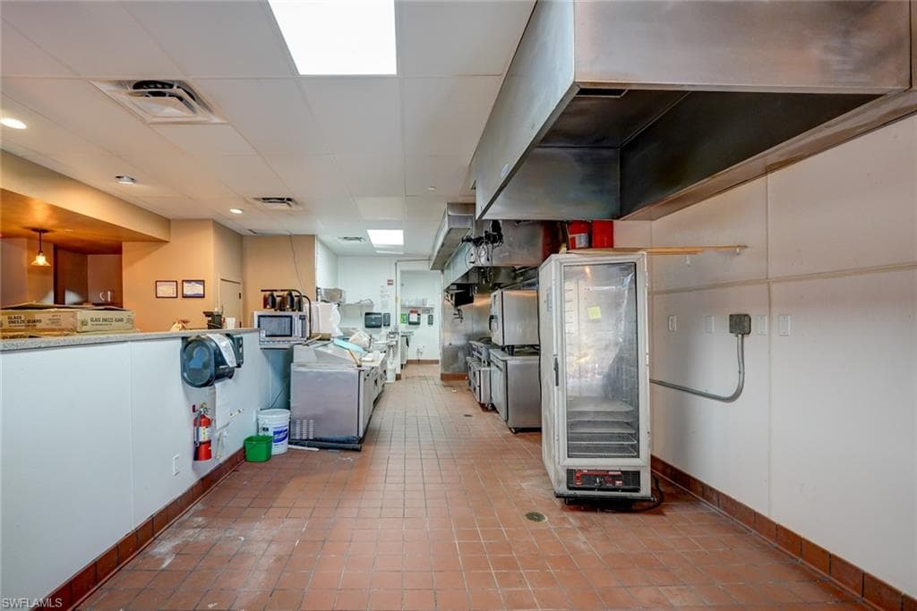 Basement with light tile floors