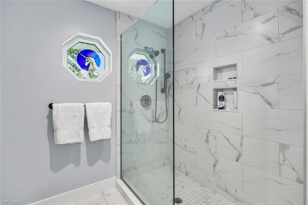 Owner's Suite Bathroom with walk-in shower. Commode and bidet also here.