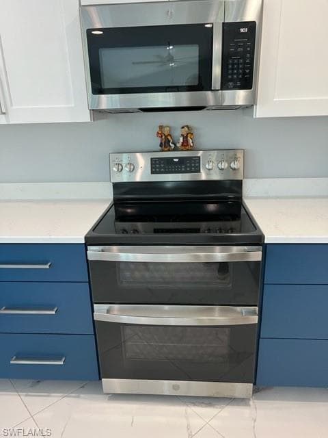 GE Double oven with microwave, convection oven and air fryer.