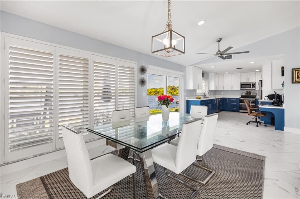 Conveniently located the dining room is close to the kitchen. Every view is to the water!