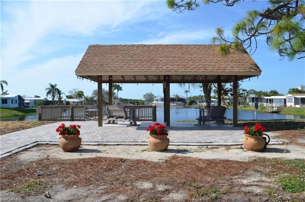 Community Lake with covered gazebo & swings