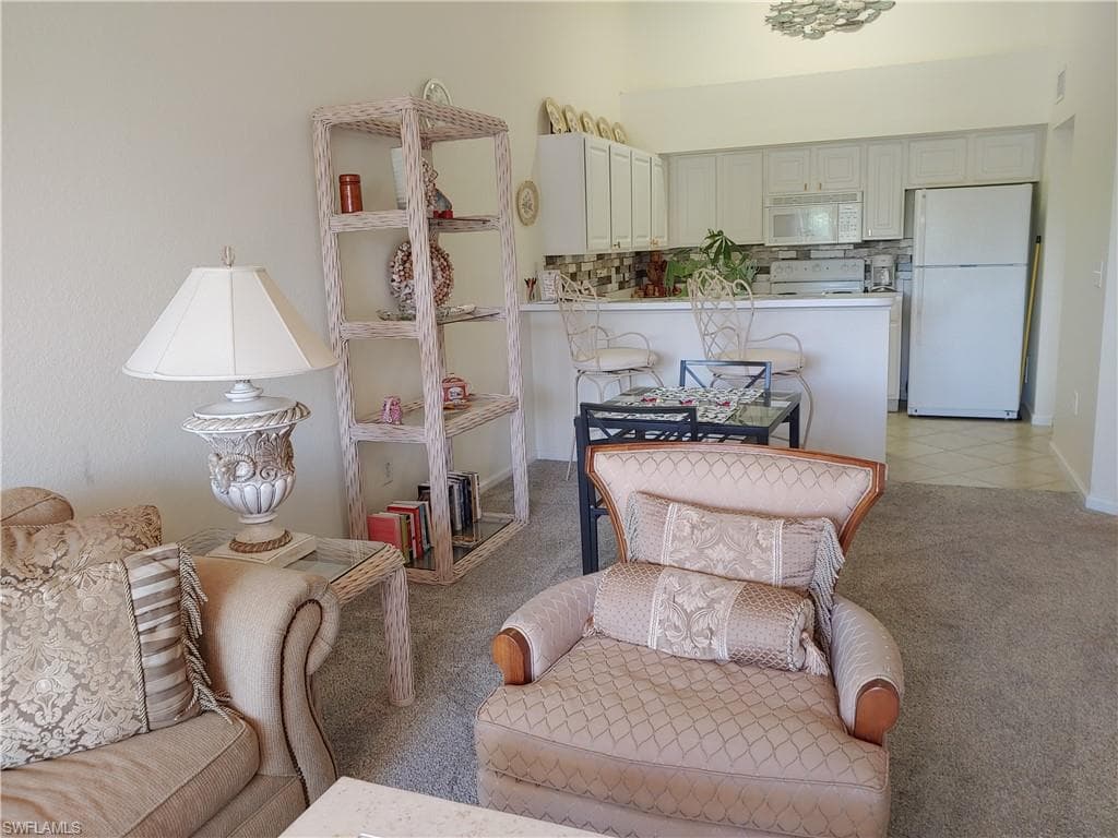 Living room with light colored carpet