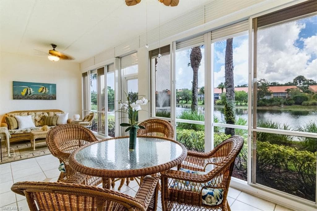 Enclosed large lanai has storm shutters, plexi panels and tile floor
