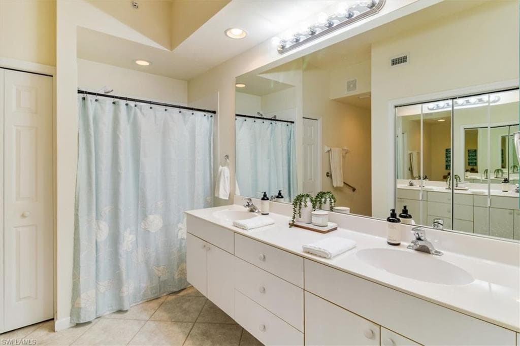 Primary bathroom has a walk-in closet and linen closet