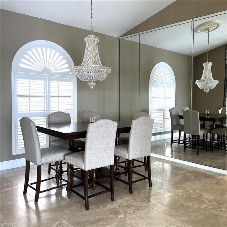 Dining space featuring a custom chandelier