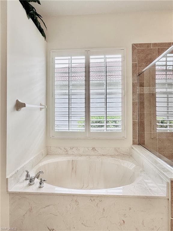 Bathroom with separate shower and tub