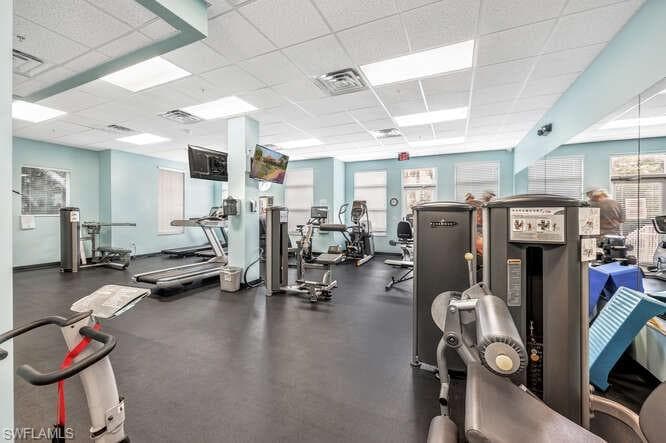 Exercise room featuring a drop ceiling