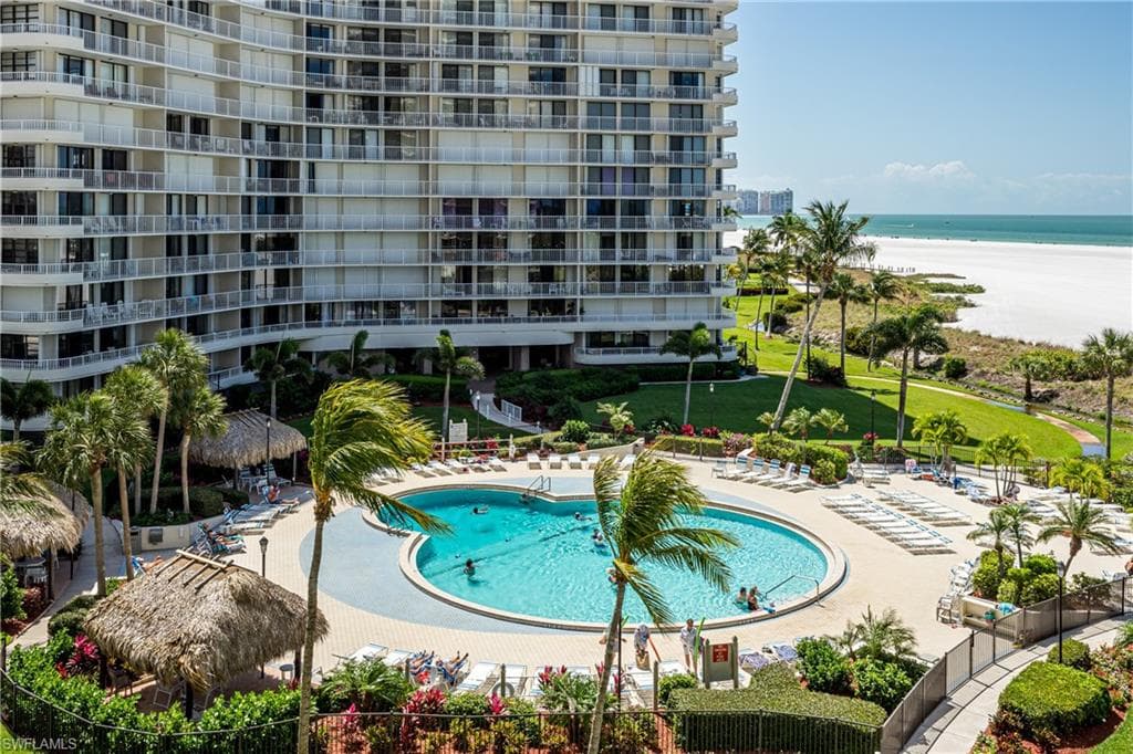 View of pool featuring a water view