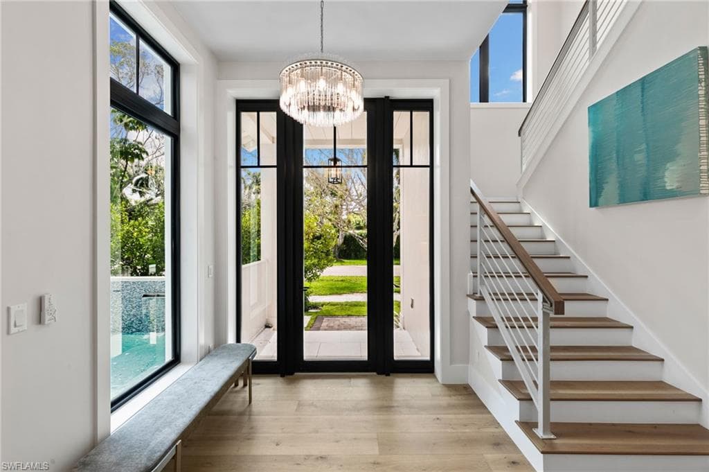 Front Porch and Entry hall shine with Southern Sun, Sparkling Pool View and Chic Chandelier