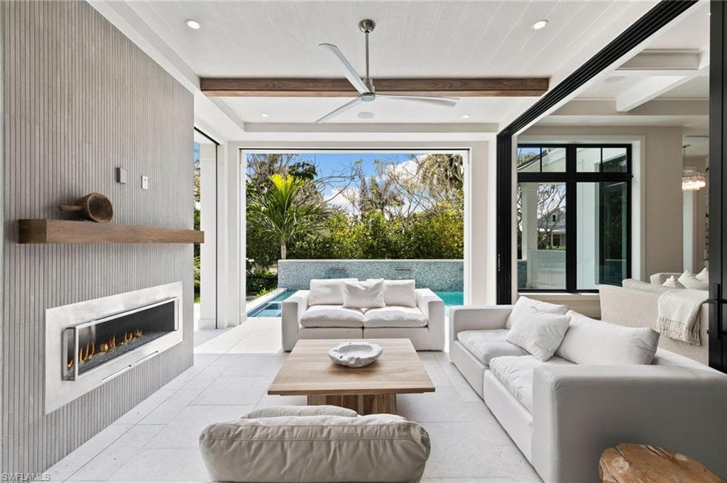 Open to the Entire Main Living, this Outside Living has screens for use in the evening and Storm Shutters for Rain and Storm Protection