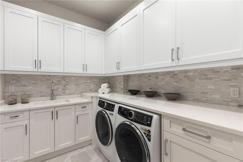 Laundry Room main level provides everything you need fitted with Electrolux Washer/Dryer 2nd Laundry Upstairs