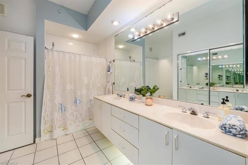 Primary bathroom with walk-in and linen closets