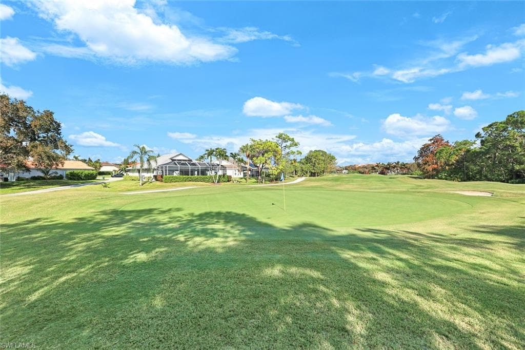 View of home's community featuring a lawn