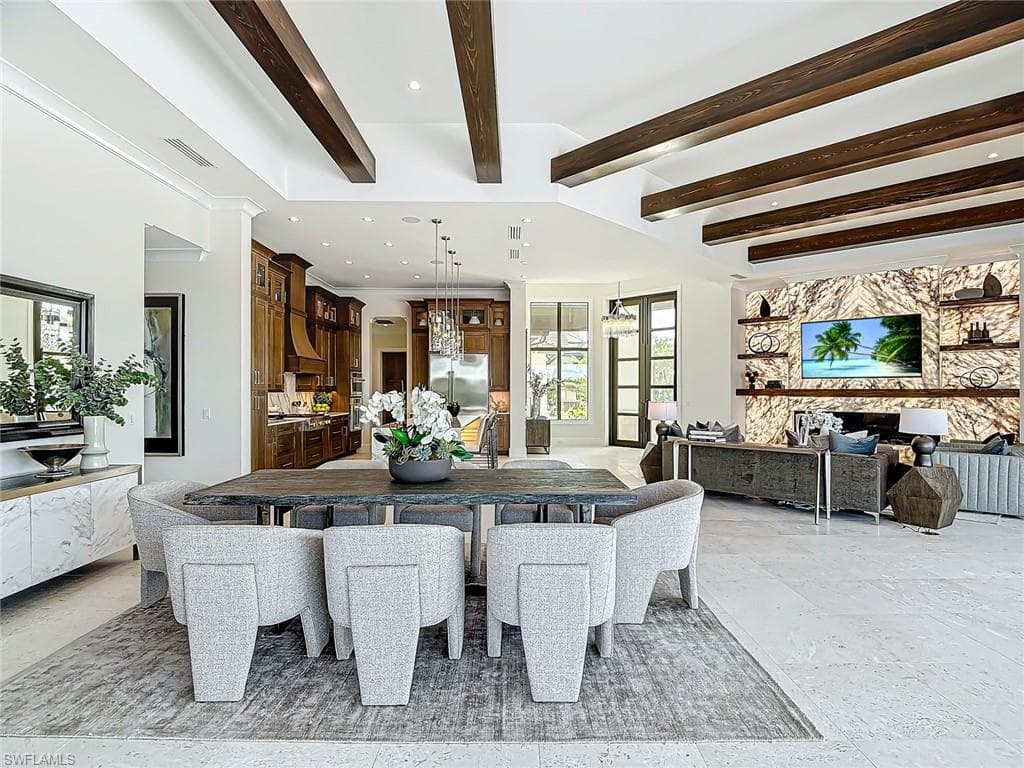 From every angle the great room is super impressive. Notice the shell stone tile throughout.