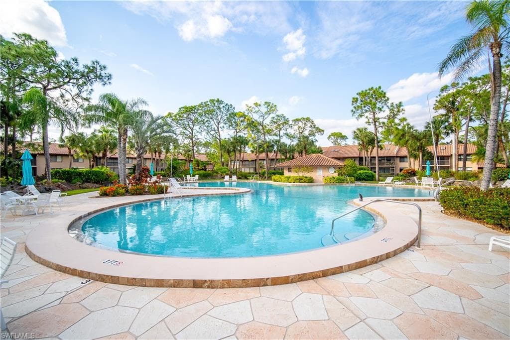 View of swimming pool with a patio