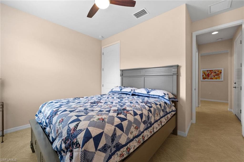 Bedroom featuring ceiling fan