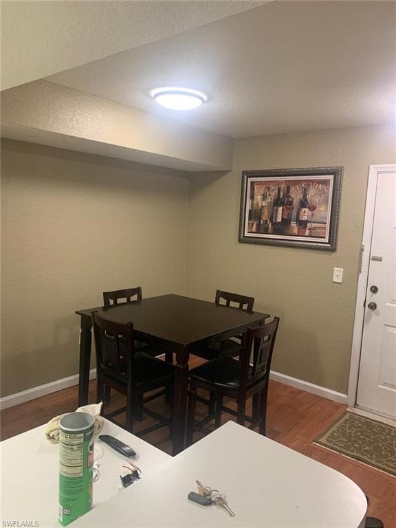 Dining room featuring dark hardwood / wood-style flooring
