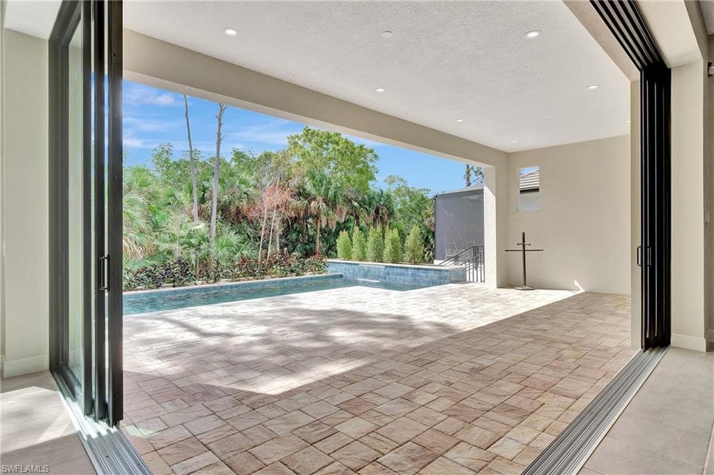 Zero/Corner sliding door open. View from kitchen/living area