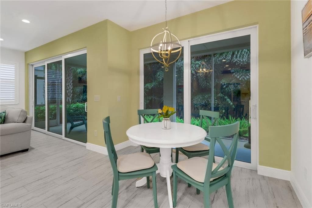 Dining area with large sliders to bring in the light!