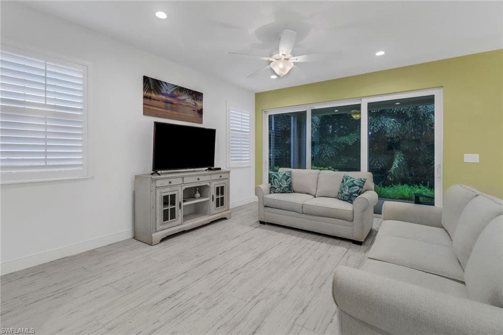 Living room featuring plantation shutters