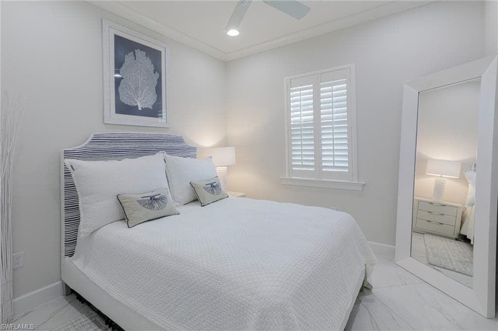 Bedroom featuring ceiling fan