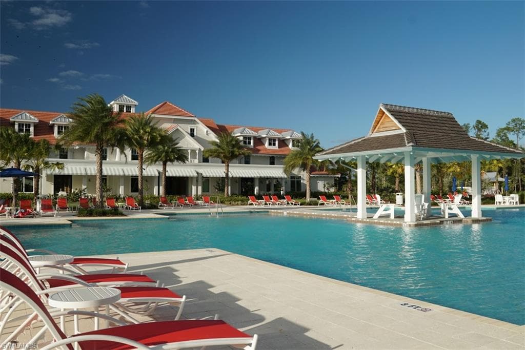 View of swimming pool featuring a gazebo and a patio
