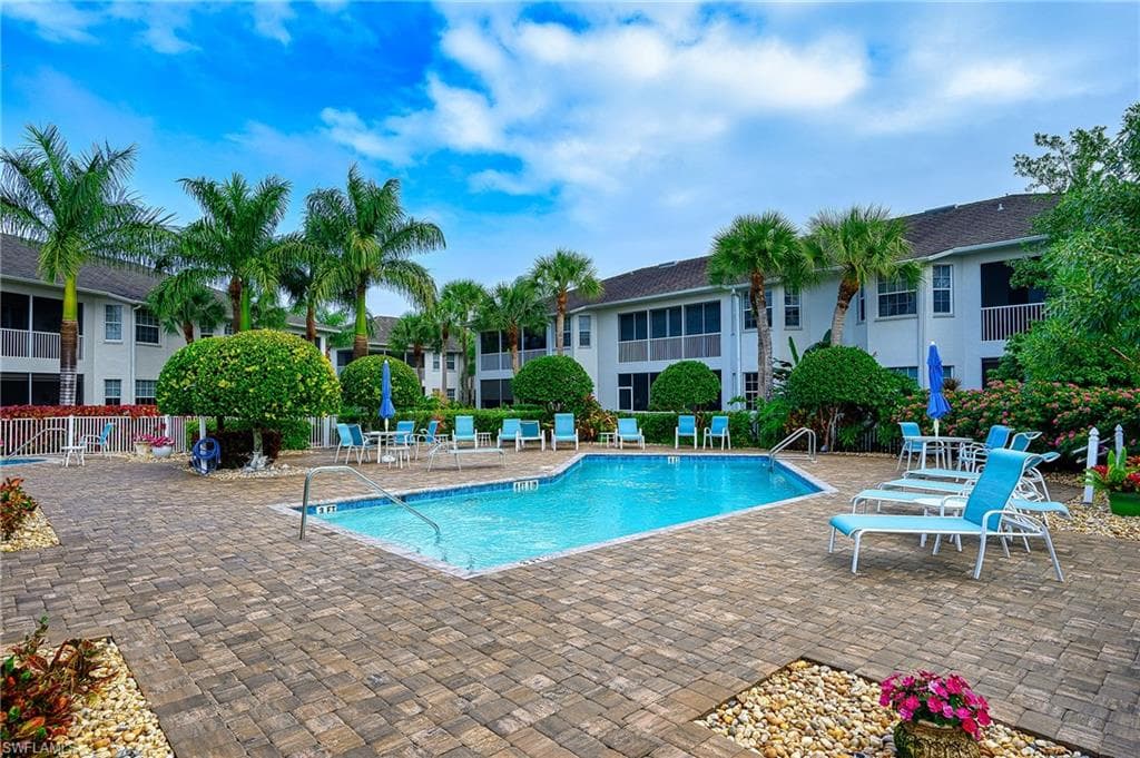COMMUNITY POOL NESTLED IN THE MIDST OF CARRIAGE HOMES
