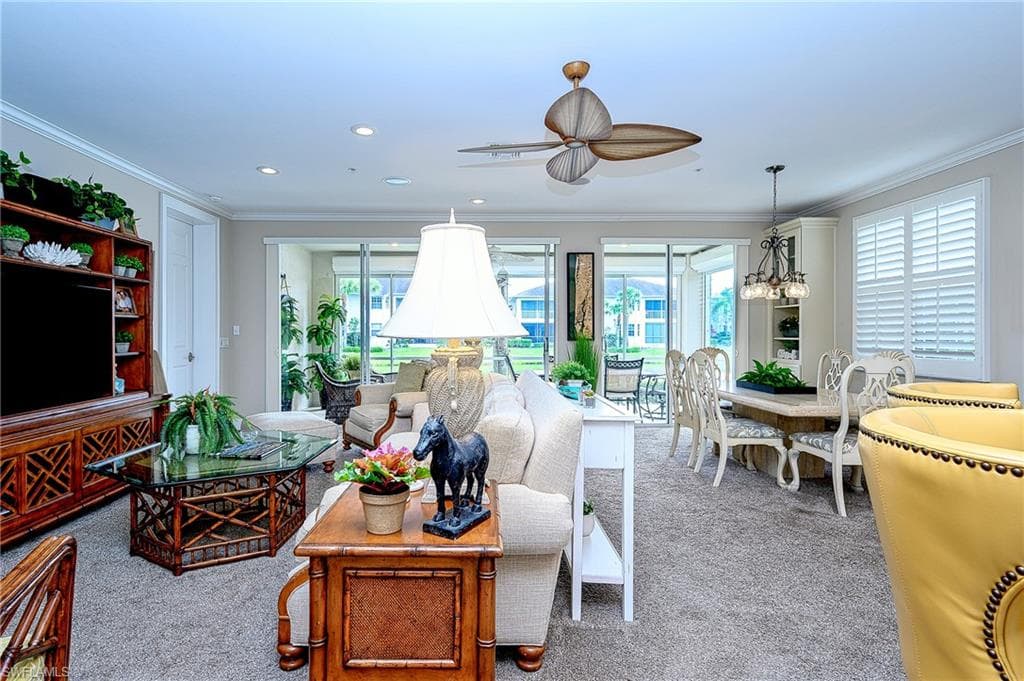 LOOKING EAST TO THE LIVING ROOM AND VIEW