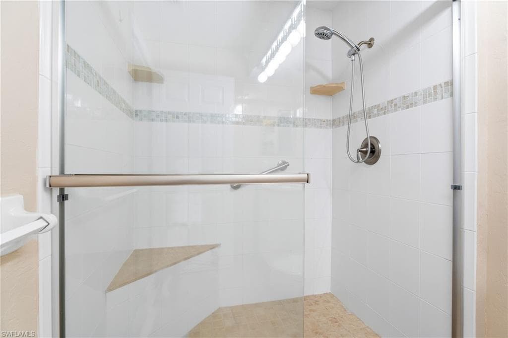 Bathroom featuring walk in shower