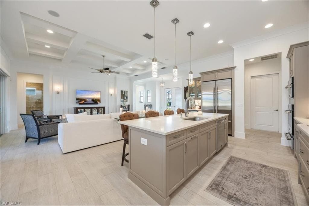 The home features a Sonos sound system and Uxari Smart Home which controls the security system and cameras, thermostat, lights in the main living areas and kitchen, and shades overlooking the lanai