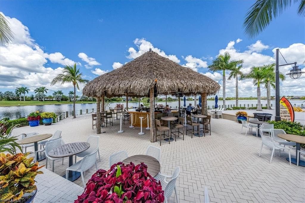 Meet your friends for a drink at the Tiki bar poolside