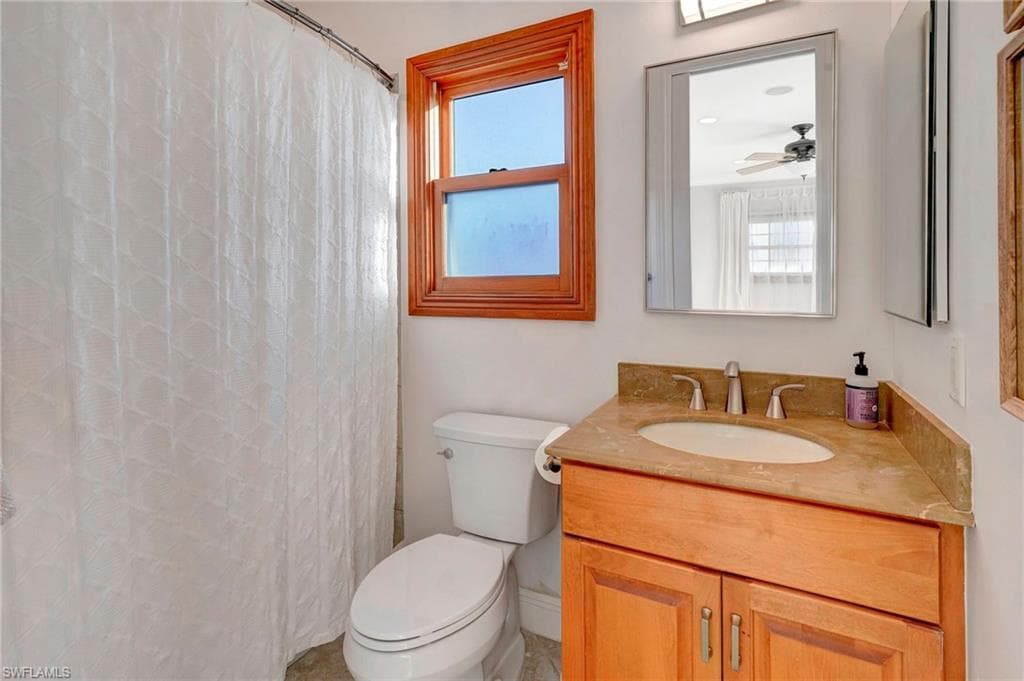 Bathroom with vanity and toilet