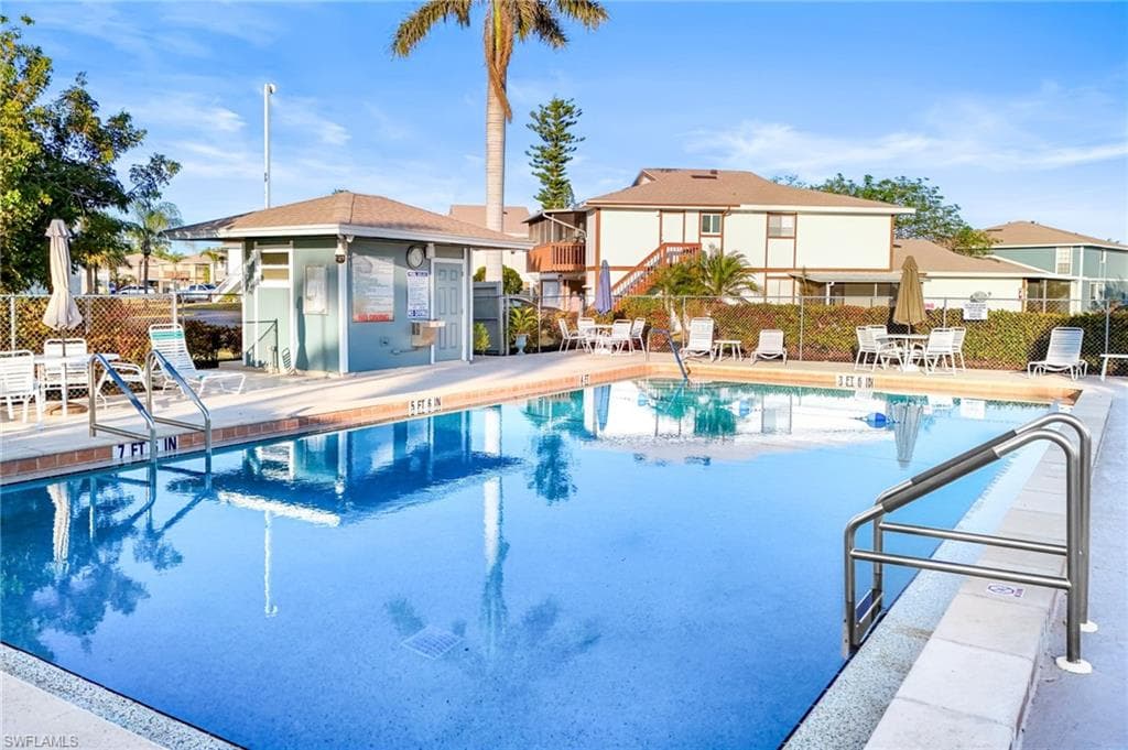 View of swimming pool with a patio