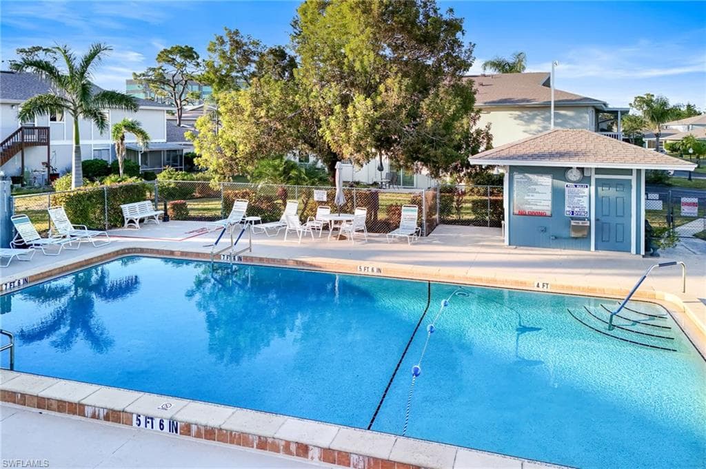 View of swimming pool with a patio area