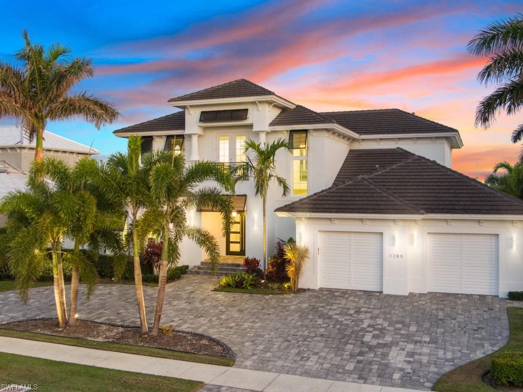 Gulf-coast waterfront at twilight — the Marco Island market