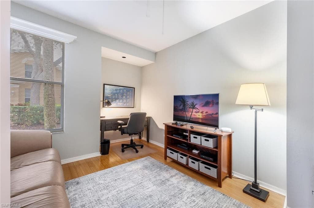 Office space featuring hardwood / wood-style flooring