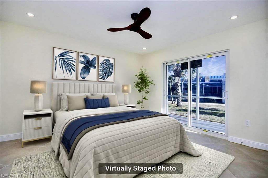 Bedroom featuring access to outside and ceiling fan